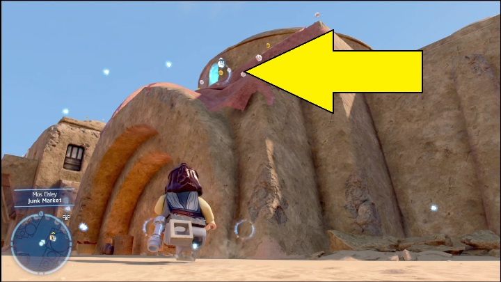 Tę znajdźkę zobaczycie naprzeciwko Niech czas będzie z tobą - LEGO Star Wars The Skywalker Saga: Mos Eisley - lista wszystkich łamigłówek - LEGO Skywalker Saga - poradnik do gry