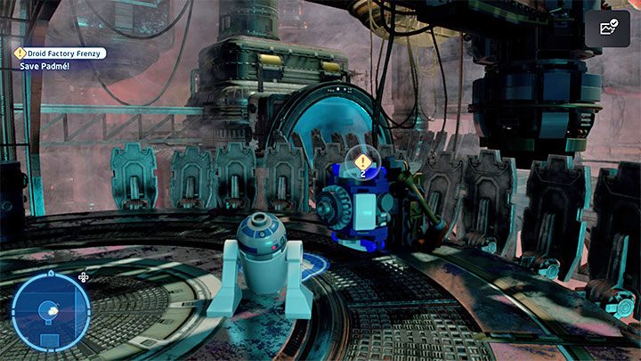 Na potrzeby uratowania Padme musicie też wejść w interakcję z niebieskim terminalem i jeśli chcecie zdobyć wyzwanie Co ma wisieć, nie utonie, to pośpieszcie się z zaliczeniem mini-gry dzięki dopasowaniu pierścieni - LEGO Skywalker Saga: Fanaberie w fabryce droidów (Droid Factory Frenzy) - solucja, opis przejścia - LEGO Skywalker Saga - poradnik do gry