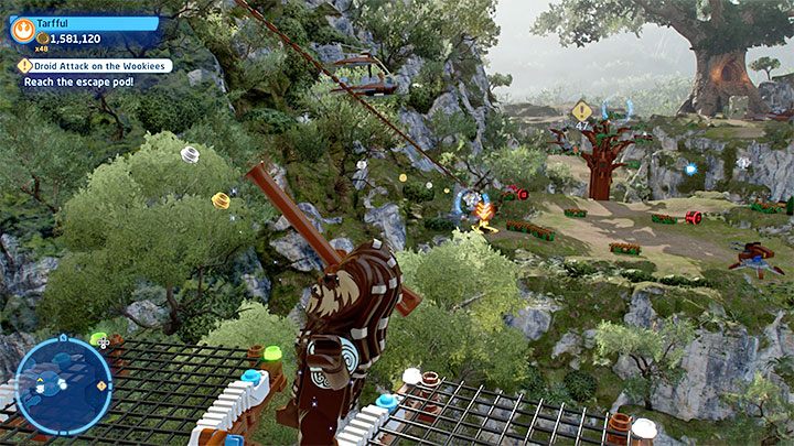 Dotrzecie do ściany i tym razem do akcji musi przystąpić Yoda żeby wyciąć dowolny otwór i przyczynić się do zburzenia ściany - LEGO Skywalker Saga: Atak droidów na wookieech (Droid Attack on the Wookiees) - solucja, opis przejścia - LEGO Skywalker Saga - poradnik do gry