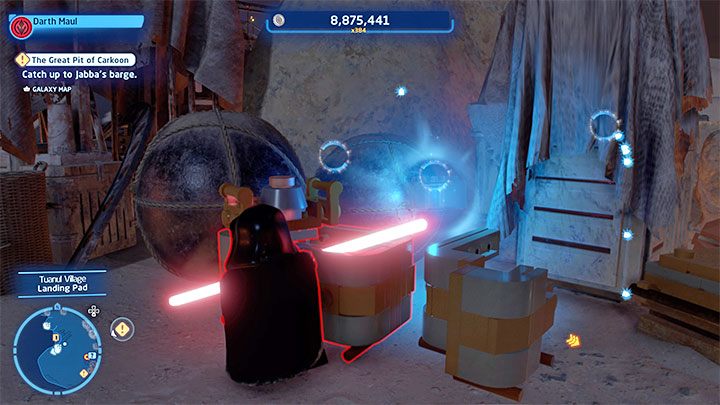 Zdobycie znajdźki jest bardzo łatwe - musicie jedynie rozbić kilka małych przedmiotów, za którymi ukryto klocek - LEGO Skywalker Saga: Wioska Tuanul (Tuanul Village) - lista wszystkich łamigłówek - LEGO Skywalker Saga - poradnik do gry