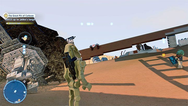 W okolicy znajdują się 4 tarcze i musicie trafiać w nie z użyciem blastera, przy czym miejcie świadomość, że po ostrzelaniu pierwszej z nich rozpocznie się odliczanie - LEGO Skywalker Saga: Osada Niima (Niima Outpost) - lista wszystkich łamigłówek - LEGO Skywalker Saga - poradnik do gry