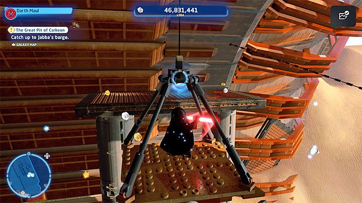 Podczas przeprawy pomóżcie sobie złapaniem się liny i rozbujaniem na niej - LEGO Skywalker Saga: Osada Niima (Niima Outpost) - lista wszystkich łamigłówek - LEGO Skywalker Saga - poradnik do gry