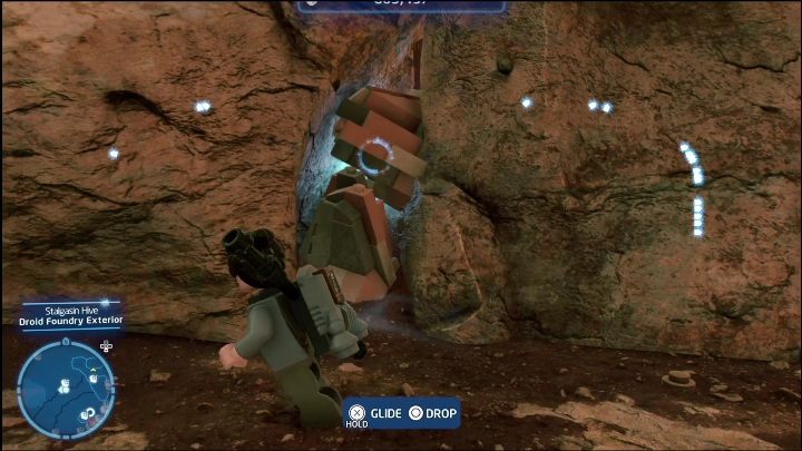 Klocek schowany jest w luce pomiędzy skałami - LEGO Skywalker Saga: Ul Stalgasin - lista wszystkich łamigłówek - LEGO Skywalker Saga - poradnik do gry