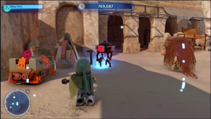 Ten klocek posiada jeden z droidów spacerujących w południowej części lokacji - LEGO Skywalker Saga: Mos Espa - lista wszystkich łamigłówek - LEGO Skywalker Saga - poradnik do gry