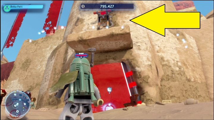 Ta znajdźka zamknięta została w niewielkim pomieszczeniu, aby się do niej dostać musicie jedynie pociągnąć za dźwignię - LEGO Skywalker Saga: Mos Espa - lista wszystkich łamigłówek - LEGO Skywalker Saga - poradnik do gry