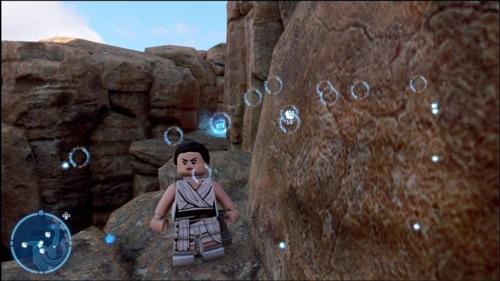 Klocek leży na niewielkiej półce skalnej, do której musicie dolecieć - LEGO Skywalker Saga: Pustynia Jundlandii- lista wszystkich łamigłówek - LEGO Skywalker Saga - poradnik do gry