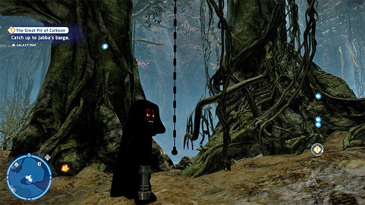 Sekret jest ukryty wysoko na drzewie, ale dotarcie do niego jest proste - rozejrzyjcie się za rozwieszoną liną z powyższego obrazka - LEGO Skywalker Saga: Bagno smokowęża - lista wszystkich łamigłówek - LEGO Skywalker Saga - poradnik do gry