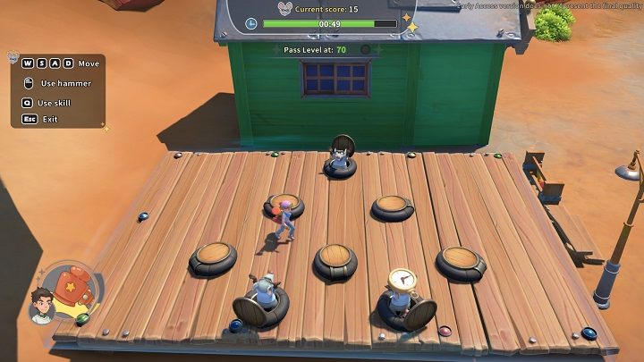 Aby zagrać w Whac-a-mole, należy podejść do młotów stojących obok budynku - My Time at Sandrock: Game Center - My Time at Sandrock - poradnik do gry