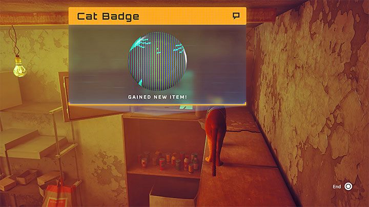 W sejfie jest odznaka kota (Cat Badge) - to jedna z kategorii znajdziek w grze - Stray: Zagadka z sejfem w sklepie - Śródmiasto (Midtown) - Stray - poradnik do gry