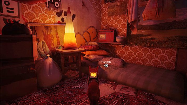 W bibliotece rozejrzyjcie się za bocznym pomieszczeniem częściowo zasłanianym przez wieże z książek - Stray: Slumsy (The Slums), rozdział 4 - solucja, opis przejścia - Stray - poradnik do gry