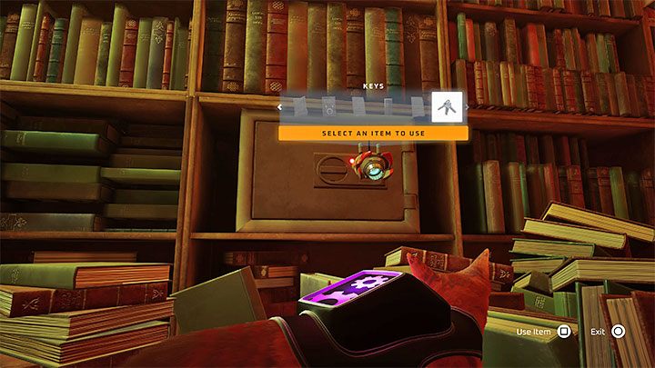 Sejf skrywający notatnik Doca jest na jednej z półek w głównym obszarze biblioteki - Stray: Slumsy (The Slums), rozdział 4 - solucja, opis przejścia - Stray - poradnik do gry