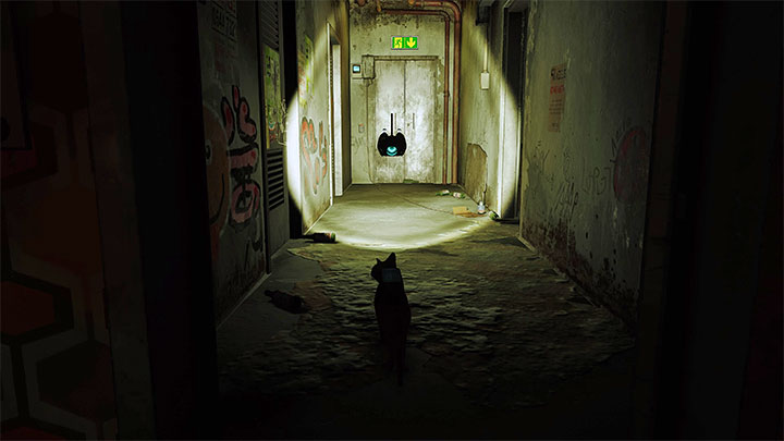 Znajdziecie się w ciemnym korytarzu, w którym warto pomagać sobie latarką B-12 - Stray: Zagadka z kodem do zamkniętych drzwi - Mieszkanie (The Flat) - Stray - poradnik do gry