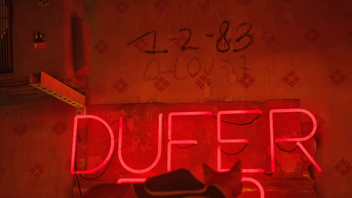 W barze wskoczcie na ladę i zbadajcie lewy obrazek wiszący na ścianie - Stray: Zagadka z sejfem i notatką z kodem binarnym - Slumsy (The Slums) - Stray - poradnik do gry