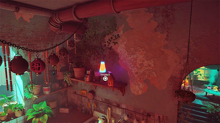Ostatni ślad to zapalona lampa, którą postawiono na wyższej półce w kuchni - wykonajcie 2 skoki żeby do niej dotrzeć - Stray: Śródmiasto (Midtown), rozdział 10 - solucja, opis przejścia - Stray - poradnik do gry