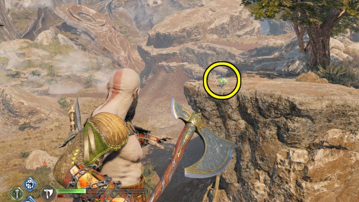 Kruk siedzi na skałach na wschód od sklepu - początkowo jest to po drugiej stronie przepaści, a później (po otwarciu zapory) może to być po drugiej stronie rzeki - God of War Ragnarok: Równiny (The Plains), Vanaheim - sekrety, znajdźki - God of War Ragnarok - poradnik do gry