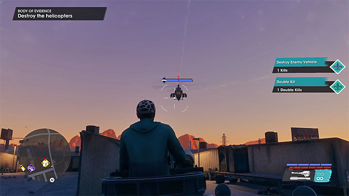 Na terenie lokacji z magazynami znajduje się wóz opancerzony - wejdźcie do niego i przejmijcie kontrolę nad jego działkiem - Saints Row 2022: Corpus delicti (Body of Evidence) - solucja, opis przejścia - Saints Row - poradnik do gry