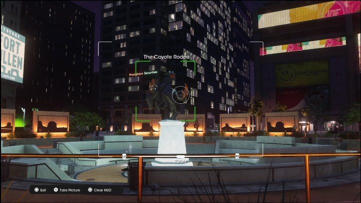 Założenie tej aktywności to zrobienie jednego zdjęcia figury znajdującej się po środku fontanny, aby zaliczyć to zadanie musicie jednie unieść aparat i uchwycić marmurowego kojota - Saints Row 2022: Odkrycia (Północne Lakeshore) - lista i opisy aktywności - Saints Row - poradnik do gry