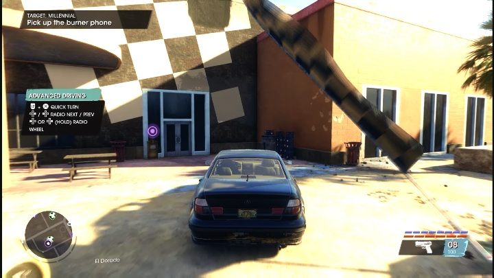 Gdy dotrzecie do miejsca oznaczonego na mapie, zobaczycie telefon przypięty do budynku koło toru wyścigowego - Saints Row 2022: Millennial - jak wykonać? - Saints Row - poradnik do gry