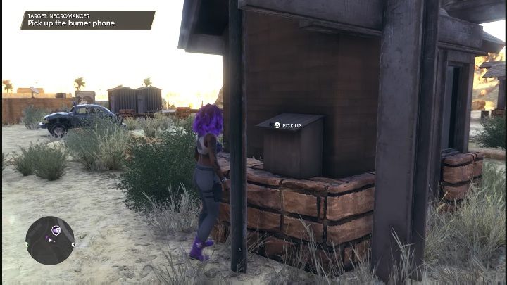 Gdy dotrzecie do miejsca oznaczonego na mapie, zobaczycie telefon przypięty do ściany budynku - Saints Row 2022: Necromancer - jak wykonać? - Saints Row - poradnik do gry