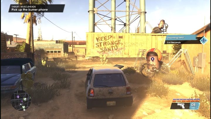 Gdy dotrzecie do miejsca oznaczonego na mapie, zobaczycie telefon przypięty do metalowego obiektu, przypominającego motocyklistę albo rajdowca - Saints Row 2022: Musclehads - jak wykonać? - Saints Row - poradnik do gry
