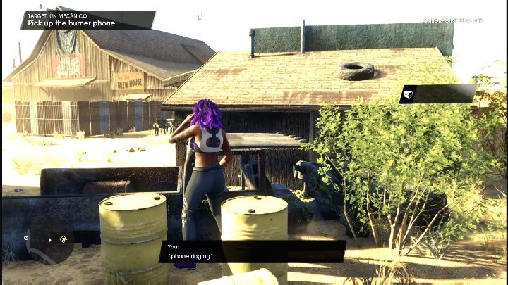 Gdy dotrzecie do miejsca oznaczonego na mapie, zobaczycie telefon przypięty do wraku samochodu - Saints Row 2022: Un Mecanico - jak wykonać? - Saints Row - poradnik do gry
