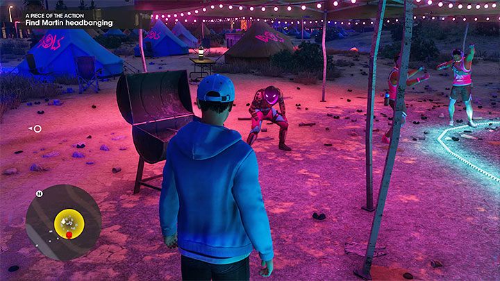 Kolejna osoba do znalezienia to Martin - pokazuje go powyższy obrazek i znajdziecie go obok grilla - Saints Row 2022: Odrobina emocji (A Piece of the Action) - solucja, opis przejścia - Saints Row - poradnik do gry