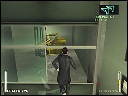 Wejdź do pomieszczenia i podejdź do szyby, tak by mieć żółte maszyny przed sobą - [Ghost] The Post Office - Redirected | Enter The Matrix - Enter The Matrix - poradnik do gry