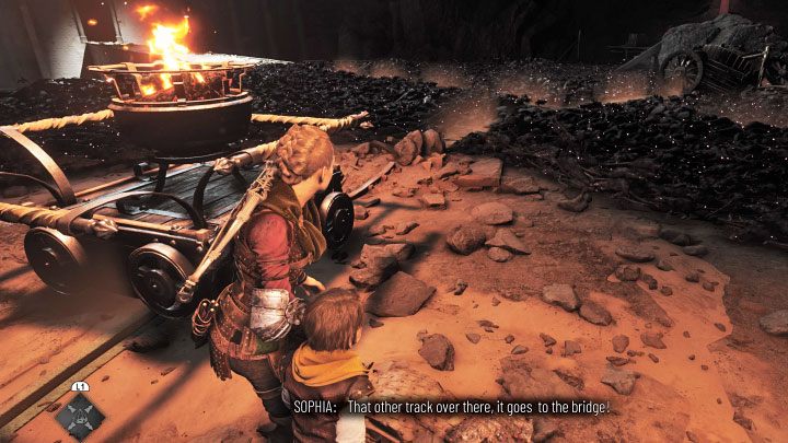 Zacznijcie przesuwać po szynach lewy wagonik - Plague Tale Requiem: Eksploracja podziemnej lokacji (Explore the underground area) - solucja, opis przejścia - A Plague Tale Requiem - poradnik do gry