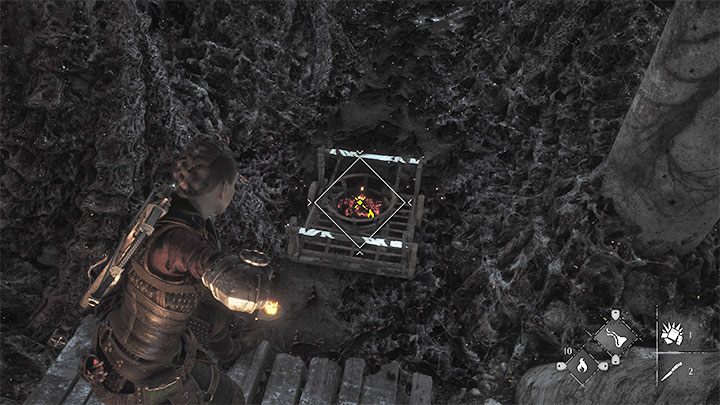 Znajdźcie na dole wóz na kółkach i podpalcie jego kosz z użyciem Ignifera - Plague Tale Requiem: Otwarcie bramy (Open the gate) - solucja, opis przejścia - A Plague Tale Requiem - poradnik do gry