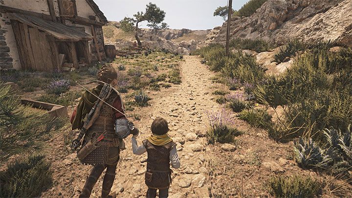 Po rozpoczęciu eksploracji otwartej mapy wyspy podróżujcie główną ścieżką, która prowadzi w stronę dolnych budynków - Plague Tale Requiem: Rozdział 9 (Opowieści i odkrycia) - lista sekretów - A Plague Tale Requiem - poradnik do gry