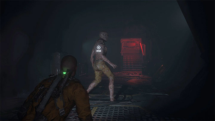 Na nowym piętrze możecie łatwo wykonać atak skrytobójczy - kucnijcie, zbliżcie się od tyłu do potwora i dźgnijcie go nożykiem - Callisto Protocol: Rozdział 2: Następstwa (Aftermath) - solucja, opis przejścia - The Callisto Protocol - poradnik do gry