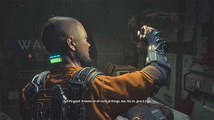 Dotrzyjcie do pomieszczenia Operating C104 - pozyskacie rękawicę GRP, która pozwala na chwytanie przedmiotów i przeciwników (przytrzymanie przycisku celowania i wciśnięcie X/A na padzie) - Callisto Protocol: Rozdział 2: Następstwa (Aftermath) - solucja, opis przejścia - The Callisto Protocol - poradnik do gry