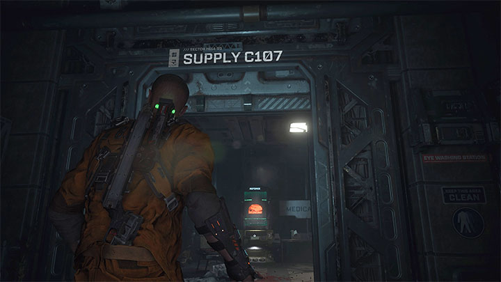 Po pokonaniu potworów dotrzyjcie na drugi koniec sali i umieśćcie bezpiecznik bramy w nowej skrzynce - odblokujecie przejście do Med Office C105 - Callisto Protocol: Rozdział 2: Następstwa (Aftermath) - solucja, opis przejścia - The Callisto Protocol - poradnik do gry