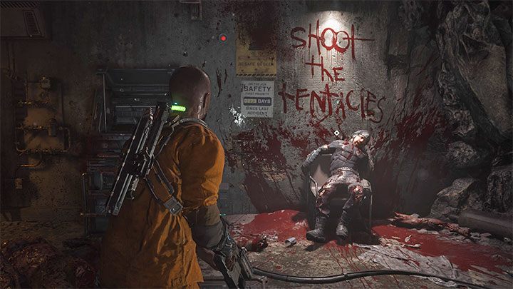 Po walce zbadajcie zwłoki strażnika pod czerwonym napisem Shoot the Tentacles - Callisto Protocol: Rozdział 3: Kopuła mieszkalna (Habitat) - solucja, opis przejścia - The Callisto Protocol - poradnik do gry