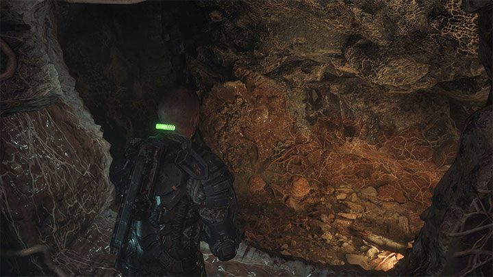 Dotrzyjcie po drabiny i po zejściu na dół uważajcie na nowy kokon z wyskakującą głową - możecie go zniszczyć z dużej odległości - Callisto Protocol: Rozdział 5: Poniżej (Below) - solucja, opis przejścia - The Callisto Protocol - poradnik do gry