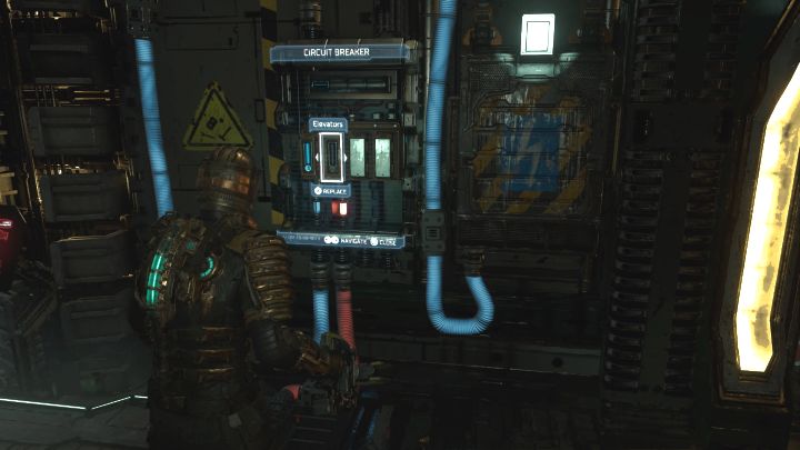 Musicie teraz wejść w interakcję z wyłącznikiem - załączcie bezpiecznik dla wind - Dead Space Remake: Intensywna terapia (Intensive Care) - Dead Space Remake - poradnik do gry