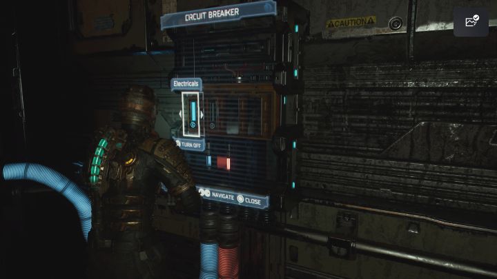W końcowej części sali znajdują się kable pod napięciem i domyślnie są one śmiertelnie niebezpieczne dla Isaaca - Dead Space Remake: Ogrom zniszczeń (Obliteration Imminent) - Dead Space Remake - poradnik do gry