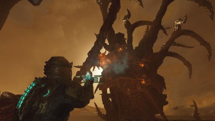 W pierwszej fazie walki Kolektyw będzie miał odsłoniętych 5 pomarańczowych gruczołów - Dead Space Remake: Agonia (Dead Space) - Dead Space Remake - poradnik do gry