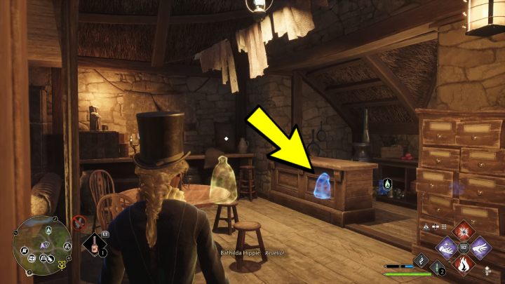 Znajdźka leży na podłodze za ladą - Hogwarts Legacy: Posążki demimoza (Demiguise Statues) - Highlandy - Hogwarts Legacy - poradnik do gry