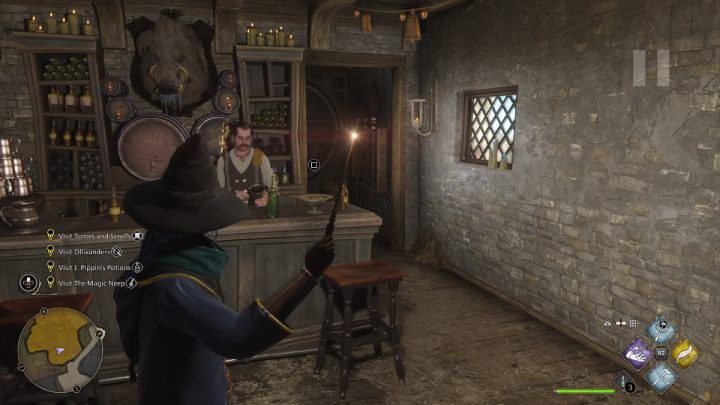 Wejdźcie do karczmy Świński Łeb (Hogs Head), jeśli po podejściu do lady nie podleci do Was ćma, przejdźcie do pomieszczenia za karczmarzem i przejdźcie przez tylne drzwi - Hogwarts Legacy: Strony przewodnika (Field Guide Pages) - Hogsmeade - Hogwarts Legacy - poradnik do gry