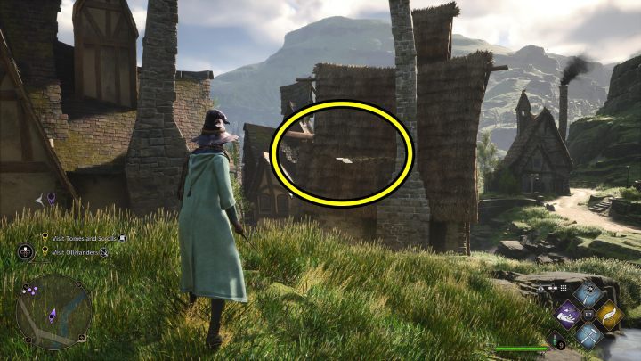 Ta latająca strona Flying Guide Page #8 (Hogsmeade) jest niedaleko mostu prowadzącego do opuszczonego budynku na wzgórzu - Hogwarts Legacy: Strony przewodnika (Field Guide Pages) - Hogsmeade - Hogwarts Legacy - poradnik do gry