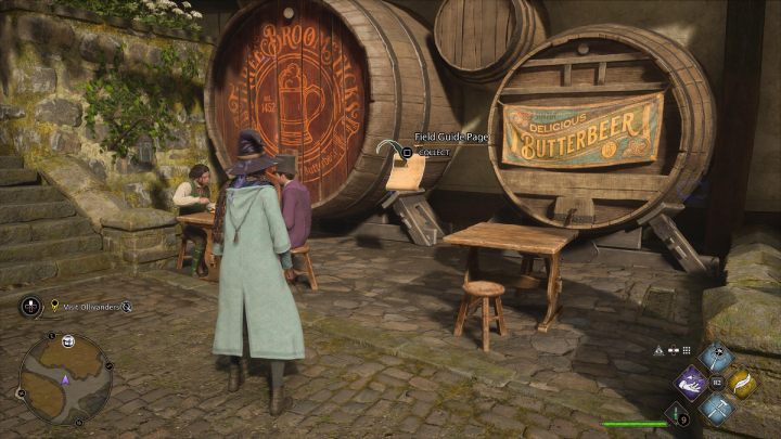 Jedną ze stron Revelio znajdziecie przy Pubie pod Trzema Miotłami (The Three Broomsticks) w centrum wioski - Hogwarts Legacy: Strony przewodnika (Field Guide Pages) - Hogsmeade - Hogwarts Legacy - poradnik do gry