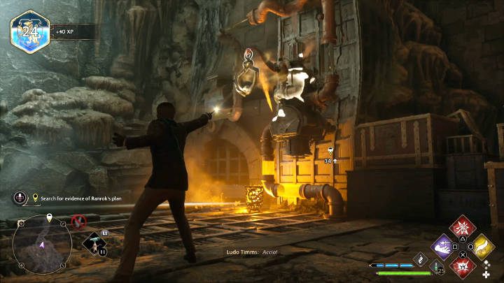 Użyjcie Accio na uchwycie widocznym na powyższym obrazku (na prawo od kotła), aby otworzyć kratę po lewej stronie, która prowadzi do tuneli - Hogwarts Legacy: To po goblidegucku (Its all Gobbledegook) - Hogwarts Legacy - poradnik do gry