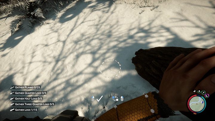 Trzymając kłodę, skierujcie kamerę na ziemię, kliknijcie prawym przyciskiem myszy, by zmienić tryb układania (pojawi się wtedy biały okrąg) i zatwierdźcie operację lewym przyciskiem myszy - Sons of the Forest: Elementy schronienia - Sons of the Forest - poradnik do gry