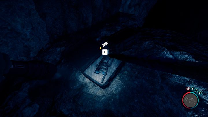 Pistolet linowy znajduje się w jednej z walizek w pobliżu stromej skarpy - Sons of the Forest 1.0: Jak zdobyć pistolet linowy? - Sons of the Forest - poradnik do gry