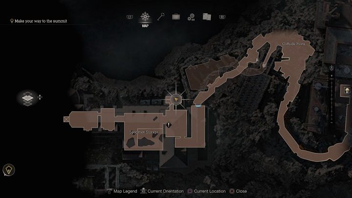 Po przejściu przez ruiny na urwisku (Cliffside Ruins na mapie) w rozdziale piętnastym (Chapter 15) znajdziecie się w Specimen Storage - magazynie z wieloma czarnymi workami zwisającymi z sufitu - Resident Evil 4 Remake: Clockwork Castellans - Resident Evil 4 Remake - poradnik do gry