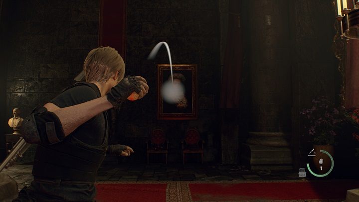 Po zdobyciu jajka weźcie je do dłoni poprzez opcję Equip na ekranie ekwipunku, a następnie rzućcie w obraz (tak samo jak granatem) - Resident Evil 4 Remake: The Disgrace of the Salazar Family - Resident Evil 4 Remake - poradnik do gry