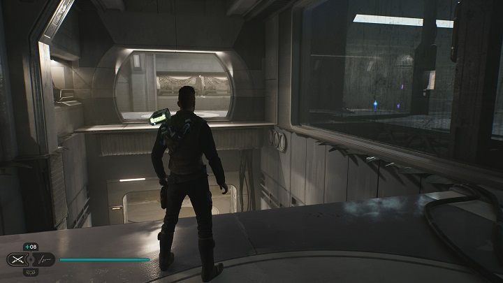 Gdy już będziecie na wyższym poziomie odwróćcie się do tyłu - zobaczycie Wasz cel za brudnymi szybami - Jedi Survivor: Koszary Jurcie - lista sekretów - Star Wars Jedi Survivor - poradnik do gry