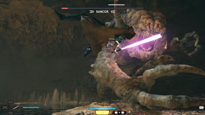 Po tym jak bossowi pozostanie już minimalna ilość zdrowia odpali się automatyczny atak kończący - główny bohater rozprawi się z potworem - Jedi Survivor: Jak pokonać bossa Rancor (Wilgotna grota na Koboh)? - Star Wars Jedi Survivor - poradnik do gry