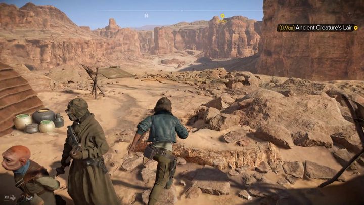 By uwolnić Hossa z rąk Tuskenów musicie udać się do pobliskiej jaskini i odebrać wykradzioną im perłę - Star Wars Outlaws: Strzelec - solucja, opis przejścia - Star Wars Outlaws - poradnik do gry